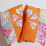 2 Orange Decorative Cover ..